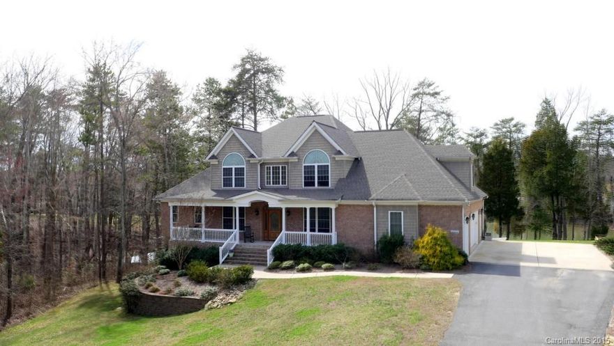 Lake Wylie custom waterfront home, Clover school district, lots of privacy on 2.1 acres. Up to five bedrooms, or use extra space for office. Huge bonus, complete with a wet bar, perfect for rec room/billiards. Choose between a main level master with luxury bath or 2nd master on the upper level. Floating dock on cove, perfect for paddling around, quick access to Big Allison channel for water sports. Large kitchen, open to 2-story great room & formal dining. Large screened porch for entertaining.