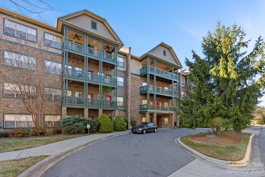 Live in the heart of Asheville! Welcome to Beaucatcher House - a modern condominium complex situated just off Tunnel Rd and only minutes to downtown Asheville. This 1 bedroom, 1 bathroom home is on the first floor for easy access and features a private patio off the living room. An open floor plan concept, there is a breakfast bar and dining area. There is a beautiful gas log fireplace with stone surround and wooden mantel. Pets are conditionally allowed and there is an on-site dog park. Some of the community features include an outdoor pool and hottub, fitness center, spacious common area with a grand stone fireplace and sitting area, covered community patio and secured building access. You can see the property video here: https://app.shindlersolutions.com/videos/110f2daf-8713-4251-a8e0-689391bcdf83 and take the Virtual Tour here: https://my.matterport.com/show/?m=ehAcykdxLKc&brand=0&mls=1& - Don't miss this opportunity - schedule your showing today!