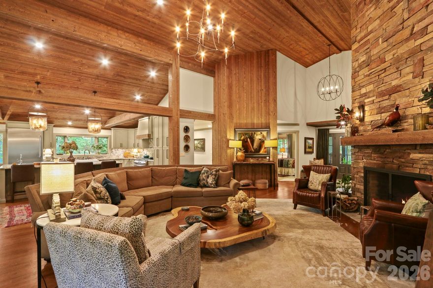 Welcome to 198 Little Harbour. Upon stepping foot on the property, find yourself transported to your own private park-like setting, centered around a gorgeous, UPDATED mountain home within the upscale, gated community of Valle Cay! Great location for full-time residents or a mountain getaway; just minutes to Valle Crucis and central to Boone & Banner Elk and right around the corner from the Valle Crucis Community Park (home to the popular Music in the Valle, on Friday nights throughout the Summer!); FURNISHED with exceptions!!! With many recent and meticulous updates (including NEW ROOF), this property offers ample outdoor and indoor living space on a double-lot combination (4.1+ acres!) with wooded privacy, seasonal mountain views, trail to sitting area in the woods, and more. An open layout creates a great flow for entertaining! The great room features a wooden cathedral ceiling, exposed beams, grand stone fireplace, & access to the spacious sunroom. Open to the living space, the kitchen offers stainless steel appliances, granite counters and backsplash, ample counter and storage space, and a sitting area complete with a mini bar - transitioning to the formal dining area with vaulted ceiling. The primary suite on the walk-in level offers private deck access and a spacious bath with large tiled shower, soaking tub, granite, and large walk-in closet (with counter & storage space). Also on the main level, find two additional bedrooms, an updated full bath, a laundry room with a sink & storage, and a formal entry foyer with unique stone flooring. Upstairs, find a large bonus room or additional living area with a vaulted ceiling and an attached full bath (potential for being used as one of the suites). The lower level offers a fun & full-of-character second living area or den with stone fireplace, office area, wet bar with granite counters, and access to the lower-level deck... as well as a full bath and a mudroom area off the two-car, oversized attached garage. An additional covered porch exists amongst the meticulously landscaped grounds, including flat, usable yards and stone walkways throughout. See MLS supplements for the full list of updates since 2020, including: new roof, gutters, interior & exterior paint, encapsulated crawlspace, whole-house dehumidifier, & much more! Exquisite landscaping, level drive.