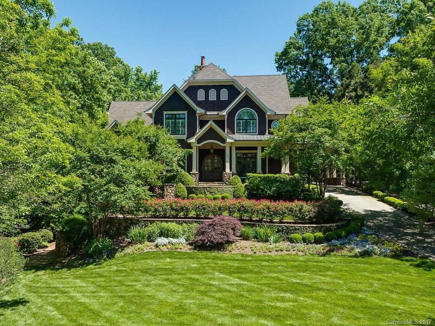 Custom Craftsman-style home set on a large, private lot in Myers Park. Open plan includes Great Room/kitchen complete with Thermador, Bosch, and SubZero appliances. Spa-like master bath includes jetted tub, seamless shower w/body sprayers, & stacked laundry in linen closet. First floor covered terrace overlooks the private backyard with wood-burning fireplace & free form pool & spa. Lower level 1200+ bottle wine cellar. 2-car detached garage w/guest suite & full bath above.