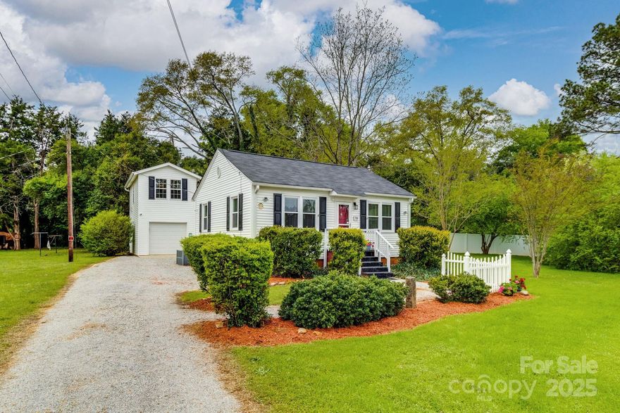 Originally a 1950s Fort Jackson Army barracks, this Winnsboro cutie was taken down to the studs in 2009 and brought back to life with hardwood floors, tons of natural light, and clever built-ins that make every inch count. It’s full of heart and history—with none of the old-house headaches. Inside, you'll find gleaming hardwood floors, pretty moldings, and tons of natural light thanks to plenty of windows. Thoughtfully designed built-ins maximize every inch. Freshly painted and a brand new roof make this one move-in ready! Outside? A sweet detached 1-car garage with a 200sf finished bonus room above—perfect for hobbies, guests, or your next side hustle. Big yard, charming vibe, and a location that keeps you close to everything. Small but mighty, and just plain precious.