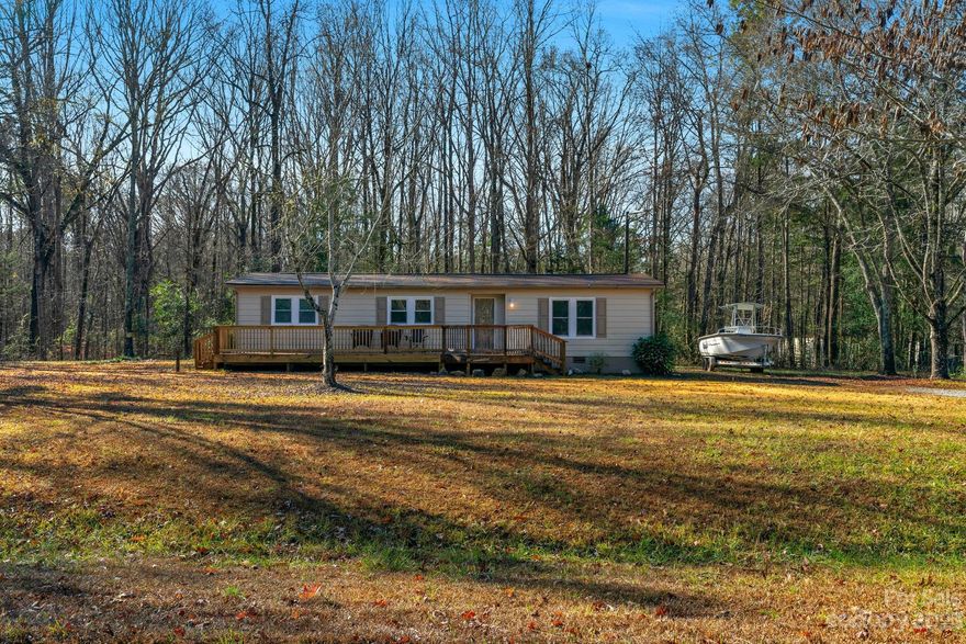 Welcome! Beautiful home with updates, BRAND NEW ROOF! Sits well on a large flat lot. With living on almost an acre across the street from Landsford Canal State Park, one can simply live peacefully in a relaxed country setting with an abundant lifestyle of recreational activities. This location provides easy access to water sports, hiking, Hunting/Fishing, etc. This spectacular home has had updates such as appliances in the kitchen, painting throughout, a new front porch, etc.  Close to the York County border, this is an easily accessible home from HWY 21. Charlotte, Fort Mill, Rock Hill, Catawba River Access in the park and Lake Access on Fishing Creek Lake and Lake Wateree are all within short distances. Dave Lyle BLVD with grocery stores and other amenities is about 15 min away. 35 Minutes south of Charlotte