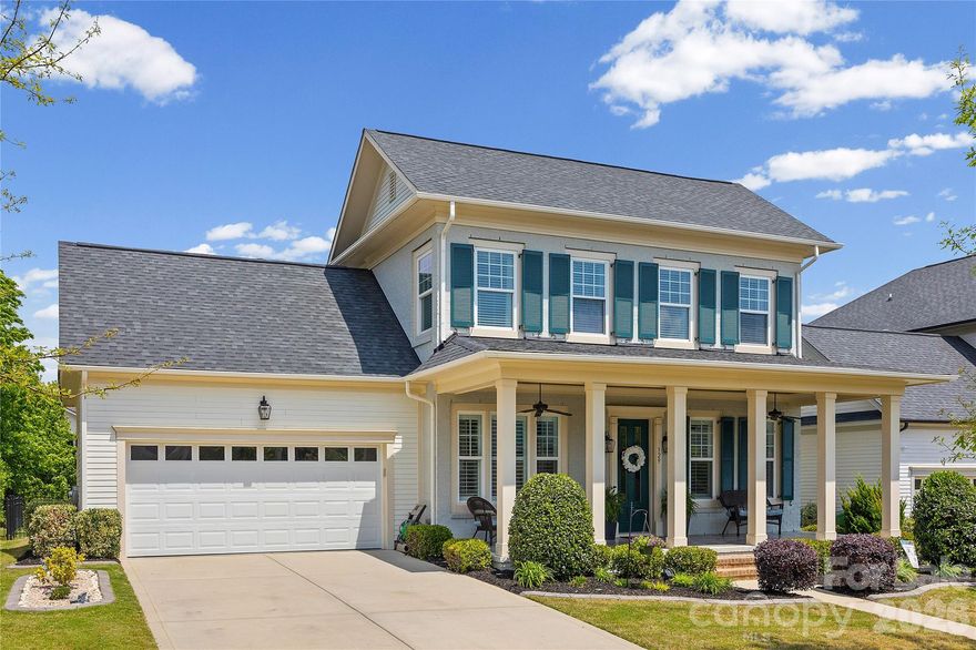 Welcome to 329 Sensibility Circle, a stunning home in the highly desirable Masons Bend community of Fort Mill. Built in 2017 by the Cunnane Group, this beautifully appointed 5-bedroom, 3.5-bath residence offers more than 3,200 square feet of refined living space, blending modern functionality with classic Southern elegance.
From the moment you step inside, you’re greeted by an open-concept design filled with natural light, rich hardwood floors, and detailed crown molding throughout. The main level features a private office, a sophisticated dining area, and a spacious great room anchored by a cozy gas fireplace—ideal for both everyday living and entertaining. Plantation shutters throughout the lower level add timeless style and privacy.
At the heart of the home is a chef-inspired kitchen designed to impress, featuring a large center island, quartz countertops, subway tile backsplash, stainless steel appliances, a five-burner gas cooktop, and a sleek hood vent. The adjoining breakfast nook overlooks the backyard, offering a bright and inviting space for casual meals.
The main-level owner’s suite provides a peaceful retreat, complete with a spa-like ensuite bath showcasing dual vanities, a tiled glass shower, and a relaxing garden tub. Upstairs, you’ll find four generously sized bedrooms, two full bathrooms, and brand-new carpet throughout, along with a spacious walk-in attic offering exceptional storage. Step outside and experience a true highlight of the home—an immaculately landscaped, fully fenced backyard that feels like a private oasis. Lush greenery, a manicured lawn, and thoughtfully curated plantings create a serene and picturesque setting. The covered and extended patio offers the perfect space to relax, dine, or entertain year-round, seamlessly extending your living space outdoors while providing both privacy and beauty. Masons Bend residents enjoy resort-style amenities including a clubhouse, fitness center, outdoor pool, playground, and scenic walking trails. Ideally located near top-rated Fort Mill schools, including Riverview Elementary, and just minutes from shopping, dining, and major commuter routes. This home delivers the perfect combination of space, style, and lifestyle—an exceptional opportunity in one of Fort Mill’s premier communities.