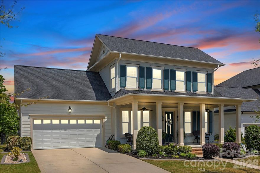 Welcome to 329 Sensibility Circle, a beautifully appointed luxury home in Fort Mill’s highly sought-after Masons Bend community. Built by the renowned Cunnane Group, this meticulously maintained 5-bedroom, 3.5-bath residence offers more than 3,200 square feet of thoughtfully designed living space, blending timeless Southern charm with modern family living. Elegant brick veneer accents, rich hardwood floors, crown molding, plantation shutters, and abundant natural light create a warm yet sophisticated atmosphere throughout.
Designed with both entertaining and everyday comfort in mind, the open-concept layout features a spacious great room with a gas fireplace, private office, formal dining area, and a chef-inspired kitchen complete with quartz countertops, stainless steel appliances, a large center island, and a sunny breakfast nook overlooking the backyard.The main-level owner’s suite offers a private retreat with a spa-like bath, while upstairs features four generously sized bedrooms, two full baths, brand-new carpet, and exceptional walk-in attic storage.
Step outside to an immaculately landscaped, fully fenced backyard designed for relaxation and family enjoyment. The covered extended patio creates the perfect setting for outdoor dining, entertaining, or quiet evenings surrounded by lush greenery and privacy. Residents of Masons Bend enjoy resort-style amenities including a clubhouse, fitness center, pool, playground, and scenic walking trails—all just minutes from top-rated Fort Mill schools, shopping, dining, and major commuter routes. 329 Sensibility Circle offers the perfect combination of luxury, comfort, and community in one of Fort Mill’s premier neighborhoods.