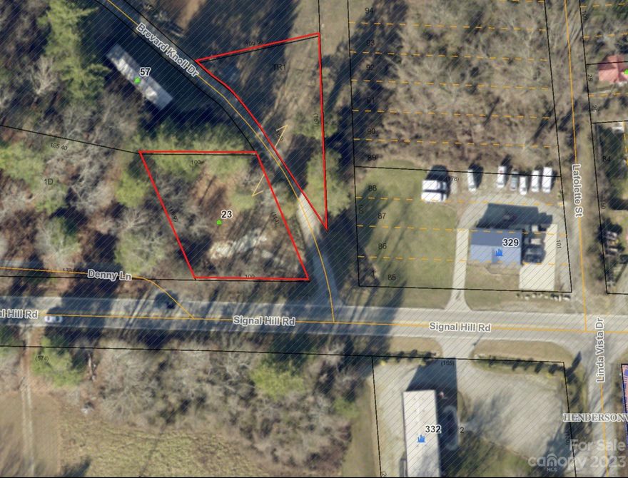 Attention Investors/Developers: Lots of potential in this lot! Located minutes from downtown Hendersonville, this parcel has potential for commercial re-zoning. Adjacent parcels have been zoned RCT (Residential Commercial Transition) and C-3 (Highway Business). No restrictions. Unique layout with 2 building sites on either side of road.