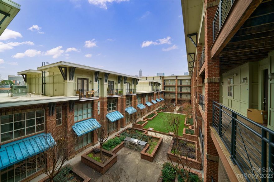 Located on a leafy, tree lined street in HOT 3rd WARD, this two bedroom, two bath condo will win your heart. Get all the benefits of living in uptown...walk to Panthers, Charlotte FC and Knights games, greenways, dog parks and Gateway area for entertainment and come home to your own slice of Charlotte in this light and bright corner unit. This condo checks all the boxes...nice flow, huge picture windows, a terrace to enjoy your morning coffee, a handsome granite kitchen and more.  As you step out, you will be greeted with skyline views peaking over the interior courtyard. Grill out, chill out and entertain in the courtyard complete with grills, seating areas, green spaces and gardens. This is a secure elevator building with gated parking garage and one assigned parking spot. Around the corner is Frazier Park complete with tennis and basketball courts, dog park and walking trails. This condo is an absolute gem in an absolutely unbeatable location.