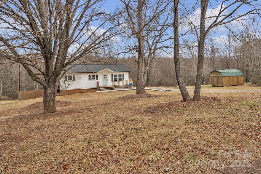 Recently renovated 3-bedroom, 2-bath home on 1.25 acres, offering the perfect mix of comfort and outdoor beauty. The finished basement provides extra living space, ideal for a recreation or family room, and includes a separate room that can be used as an additional bedroom or a home office. Step outside and enjoy the peaceful setting with a scenic creek running through the back of the property and raised gardening beds- just waiting on your green thumb! Relax and unwind in the hot tub, surrounded by nature. This home offers modern updates with plenty of space, a brand new roof and a large outbuilding for storage.  Don’t miss this unique opportunity!