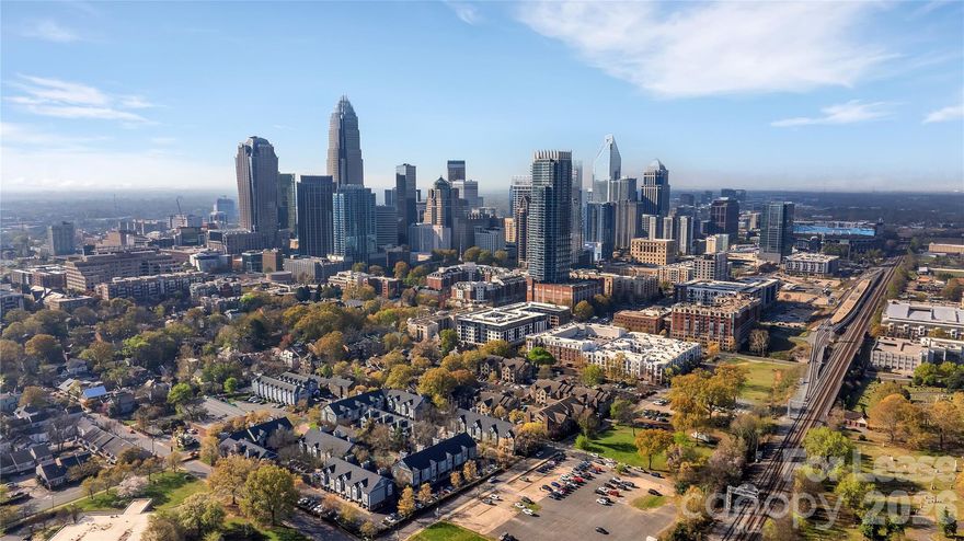 UPSCALE URBAN CAREFREE LIVING at Fourth Ward 1 Bedroom / 1 Bath condo! Bedroom has a walk-in closet and great additional storage/closet space. This unit can be rented furnished or unfurnished All Utilities included! Unit comes with a dedicated parking spot too! The living area features SLIDING GLASS DOORS to let in TONS OF LIGHT, and kitchen boasts stainless steel appliances. POOL VIEW FROM UNIT.  Chock full of amenities, Fourth Ward Square features a swimming pool, barbecue area, fire pit, fitness center and clubhouse! It's located within walking distance of Uptown restaurants and entertainment venues, as well as great outdoor options, including path through Fourth Ward Park. Frigidaire Refrigerator (2024) and washer & dryer included. Dedicated parking spot #1. New HVAC 2024 and new roof 2024! Condo interior was painted 2024. Be sure to check out the pool and fitness center with your clients! Community Features: Club House, Dog Park, Green Space, Fitness Center, Outdoor Pool, Community Rooftop Terrace, Grilling Area, Street Lights, Assigned Parking.  Can obtain one(+more ) additional parking spots via city ParkIt for 30-50$+/-year.  Safety sprinklers throughout the complex. Close to area parks, restaurants, shopping, the light rail, Truist Field, Bank of America Stadium, & Spectrum Center - Welcome Home!