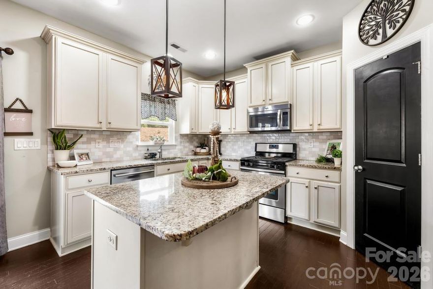 Back On Market!!!  Heres your chance to Own in Millbridge! Beautifully updated 4-bedroom, 3-bath home in sought-after MillBridge in Waxhaw with the open-concept layout today’s buyers love. This move-in-ready home features refinished hardwood floors, neutral designer paint, newer carpet in the dining room, and a bright, light-filled floor plan designed for both everyday living and entertaining.

The gourmet kitchen is a standout with a large center island, granite countertops, stainless steel appliances, and custom backsplash, all opening seamlessly to the spacious great room with built-ins, gas fireplace, and views of the private backyard with outdoor entertaining space.

Upstairs, the primary suite offers a relaxing retreat with a soaking tub, walk-in shower, and dual granite vanities. An adjacent flex space provides the perfect spot for a home office, workout area, reading nook, or bonus living space, making this home ideal for remote work and modern lifestyles. LVP flooring throughout the upstairs and stylish designer lighting add updated appeal throughout.

Enjoy quiet mornings on the charming front porch and evenings in one of Waxhaw’s most desirable amenity-rich communities. MillBridge has been recognized multiple times as Community of the Year and offers resort-style amenities including an award-winning aquatic center with lazy river, fitness center, coffee bar, clubhouse, walking trails, basketball and tennis courts, putting green, sports fields, and year-round community events.

Conveniently located just minutes from Historic Downtown Waxhaw, shopping, dining, and an easy drive to South Charlotte, this home offers the perfect blend of comfort, style, and community. If you are searching for homes for sale in Waxhaw NC, MillBridge homes, resort-style communities near Charlotte, or homes with top amenities in Union County, 1007 Hamil Ridge Drive is a must-see.

Located in MillBridge — voted Community of the Year multiple times — featuring resort-style amenities including:
• Award-winning aquatic center & lazy river
• Fitness center & coffee bar
• Basketball & tennis courts
• Putting green & sports fields
• Miles of walking trails
• Clubhouse & year-round community events

Just minutes to Historic Downtown Waxhaw shopping, dining, and charm — and convenient to South Charlotte.

If you’re searching for Waxhaw homes with amenities, MillBridge homes for sale, or resort-style living near Charlotte — this is it.