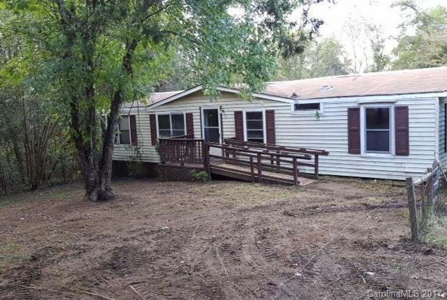 Great investment property! 3 bedroom, 2 bath with spacious living room sits in 13.02 acres. Priced to sell fast. Won't last long. Call us today to schedule an appointment!!