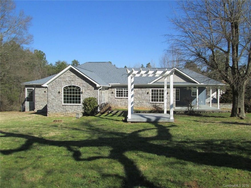 Enjoy city living with a country feel. Home has New Paint, Carpet and Appliances. This home has a stone and vinyl exterior with lots of entertaining areas. The home has nice hardwood floors and granite counter tops. The Master bedroom has 2 full his and hers bathrooms. The basement is partially finished with 2 bedrooms and 1 full bathroom. There is a Sunroom and 2 decks for entertaining. The home has rear load 2 car garage. The wired storage building has a stone front that matches the home.