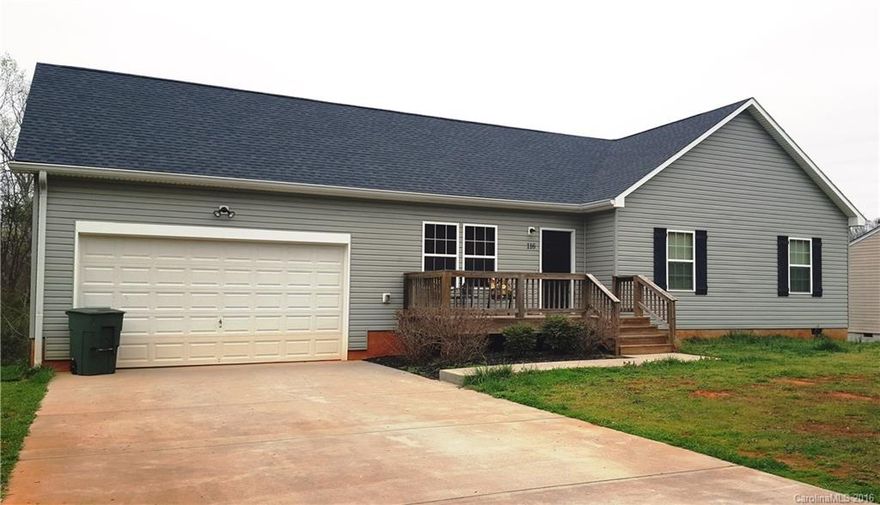 Immaculate home with open floorplan.  Wood floors, granite counter tops and white cabinets in kitchen, stainless appliances.  Lots of natural light.   Located on a quiet street with cul-de-sac.  5 minutes from I-77.