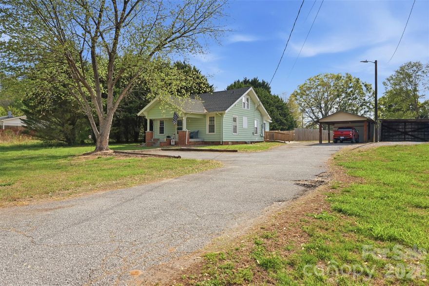 TAYLORSVILLE: Charming updated bungalow in a convenient in-town location! This 2 bedroom, 1 bath home offers character, natural light, and thoughtful updates throughout while maintaining its classic charm. Inside you’ll find fresh interior paint, refinished hardwood floors, and large windows that fill the home with light. The kitchen has been fully refreshed with new cabinets, countertops, updated lighting, and luxury vinyl plank flooring, plus a spacious sink and an island and table that will remain with the home.

The bathroom has also been updated with a new vanity, toilet, and a walk-in shower. Additional interior improvements include updated closets, refreshed lighting fixtures, and LVP flooring in the laundry area.

Outside you’ll find a large backyard with fencing, a patio area, and a carport, offering great outdoor space for relaxing, pets, or entertaining. With its cozy layout, charming beadboard details, and numerous updates, this home is a great opportunity for buyers looking for a move-in ready home close to everything in town. ADDRESS: 513 7th St. SW Taylorsville