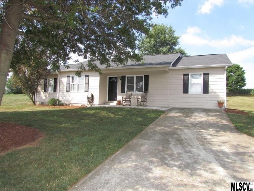 What a great value on an updated home.  This 3 bedroom, 2 bath ranch is located in a quiet country setting w/ rolling land views.  Updates include a new roof (2012), updated appliances in kitchen (2014), new carpet & paint throughout (2014).  The floors consist of hardwood, ceramic tile, and carpet flooring.  There is a master bedroom & bath, living room, and dining area.  The kitchen has an extra breakfast eat-in area that accesses the back patio.  The back yard is large and has a huge storage building.  Come check out this ready-to-move in home.  Carport was converted into living room unpermitted per seller.