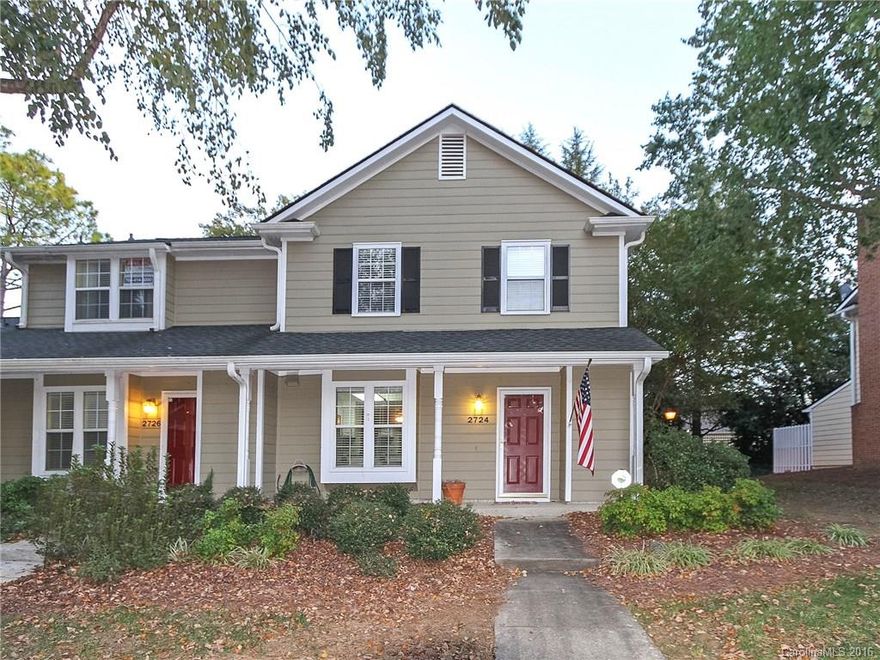 Covered front porch,, End unit with renovated kitchen, custom backsplash, custom storage in breakfast bar, private patio/retractable umbrella remains w/property, fenced. Storage outside. Custom shelving in living room.