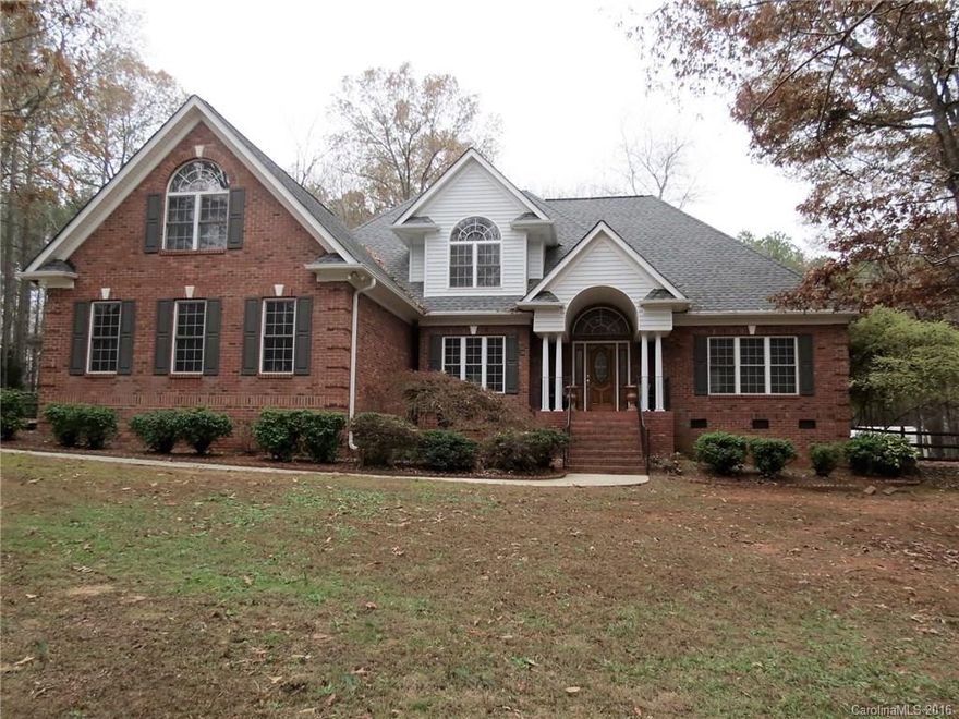 Beautiful brick home w/great location! Screened porch overlooks private fenced backyard w/large hardwoods & a storage shed. Interior has been freshly painted & carpeted- move-in ready! Features heavy trim, fireplace & vaulted ceiling in great room, formal DR, eat-in kitchen w/gas cook-top & grill, work island, master on main w/two closets, jetted tub, dual vanity, hardwood floors on main. Lg patio area for entertaining. Finished Guest room/bonus room. Outside city limits. Agent owned. NO HOA!