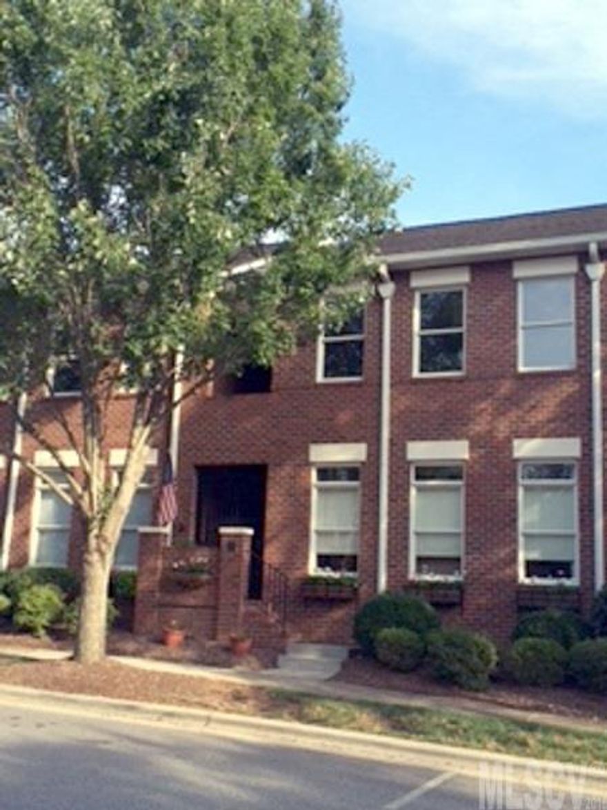 In-town living & Immaculate!! Enter your 3 BR, 2.5 BA, "Brownstone" through your gated, covered porch area. The great room boasts of beautiful hardwoods, 9 ft + ceilings, gas log fireplace that spills over to the dining room & kitchen areas. Master suite on the main level overlooks your courtyard area that is fenced for privacy. Easy walk to restaurants, shopping, & more. Call today to schedule your showing. Location, Location, Location!