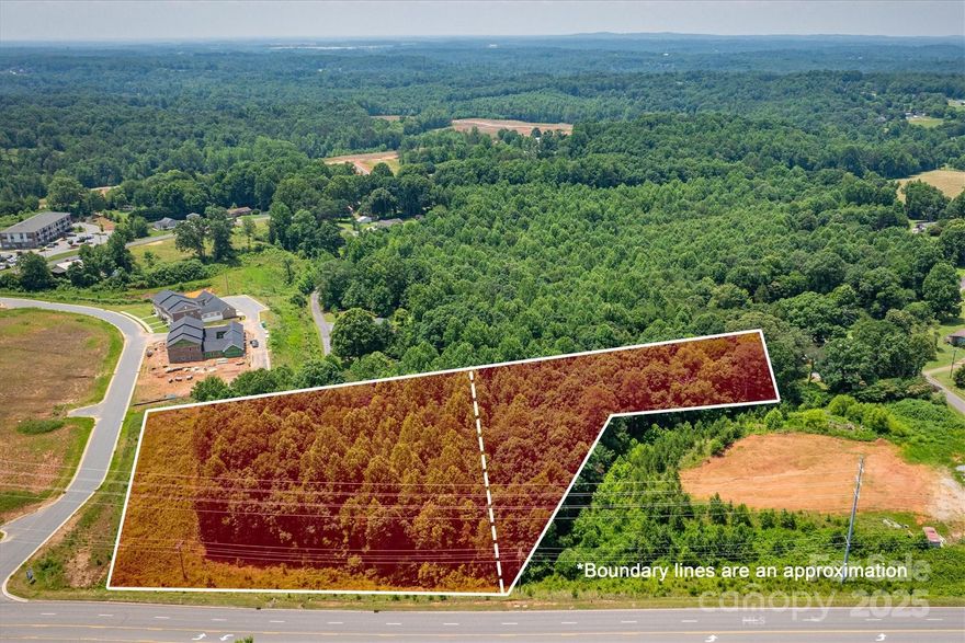 Prime development opportunity in a rapidly growing area! This expansive wooded parcel offers excellent visibility and road frontage on highly traveled Catawba Valley Blvd SE, just minutes from shopping, dining, and major thoroughfares. With convenient access to Hwy 70, I-40, Hwy 16, & surrounded by new construction, established businesses, and residential neighborhoods, this property is ideal for mixed-use, residential, or commercial development (subject to zoning). This property offers unmatched potential in a rapidly growing area so don't miss your chance to invest in one of Hickory’s most promising corridors.