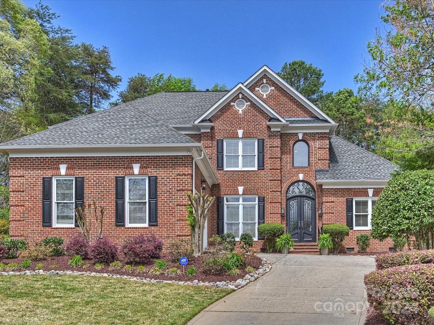 Beautiful home with lovely upgrades in a quiet cul-de-sac of popular Ballantyne Country Club.Owners made many improvements that create a perfect family and entertainment lifestyle! Open floor plan features a chef's kitchen with 6-burner gas range, large island, built in cabinets with seeded glass, white beveled subway tile backsplash open to great room with gas fireplace flanked by built-ins. Updated lighting in kitchen, foyer, great room, and office.Gorgeous Coogan Design heated saltwater pool and spa located off of charming covered,enclosed porch with bluestone hardscape to be enjoyed day and night in a private setting with grilling station and seating around outdoor fireplace.Primary bedroom suite AND second bedroom or office with full bath on main level.Make more fun memories upstairs in the media room open to a billiard room with bar. 3 additional bedrooms and 2 baths upstairs plus walk-in attic providing great storage.Nearby Ballantyne Bowl and The Amp opening soon!Don't miss it!