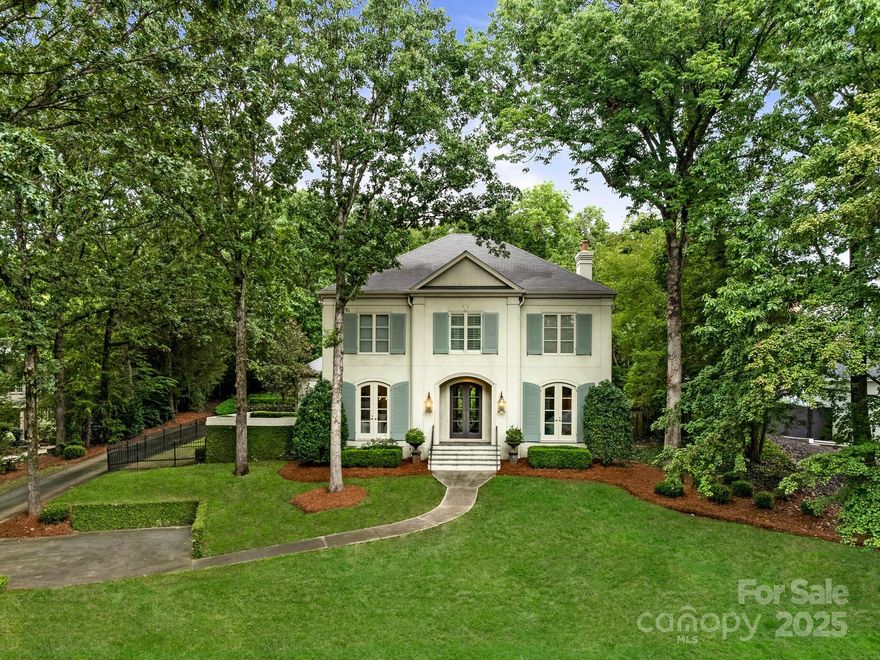 Great opportunity for custom home on .79 acre lot in sought after Gleneagles neighborhood minutes from SouthPark and Quail Hollow. This open floor plan features high ceilings, hardwood floors, custom moldings, and lots of natural light. The formal dining area has French doors to charming private terrace ideal for entertaining.  The gourmet kitchen features ample storage, large island, a Wolf range and separate Sub-Zero refrigerator, freezer and is open to great room. 
Spacious primary suite features updated spa like bath with walk-in shower, soaking tub and ample closet space. Third floor bonus room can be used in multiple ways and also has easy access to additional storage.
Guest suite with full bath above garage has separate entry creating privacy for guests. 
Covered screened outdoor living with fireplace for year-round enjoyment includes sitting area and dining space overlooking the professionally landscaped, fully fenced, private rear lawn.