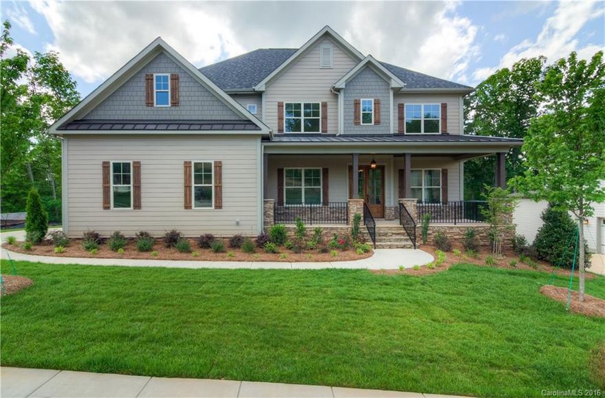 Location, Location, Location! Estate home in Tega Cay in the Prestigious Lake Ridge Manor Community. FULLY FINISHED BASEMENT. Side load garage, gourmet kitchen with double ovens. Screened in porch on private lot. Backs up to woods! Coffered ceiling in dining room and extensive, detailed mouldings throughout. Highly acclaimed Fort Mill Schools, close to I-77, restaurants and shopping galore.  Come and see what Tega Cay living is all about!