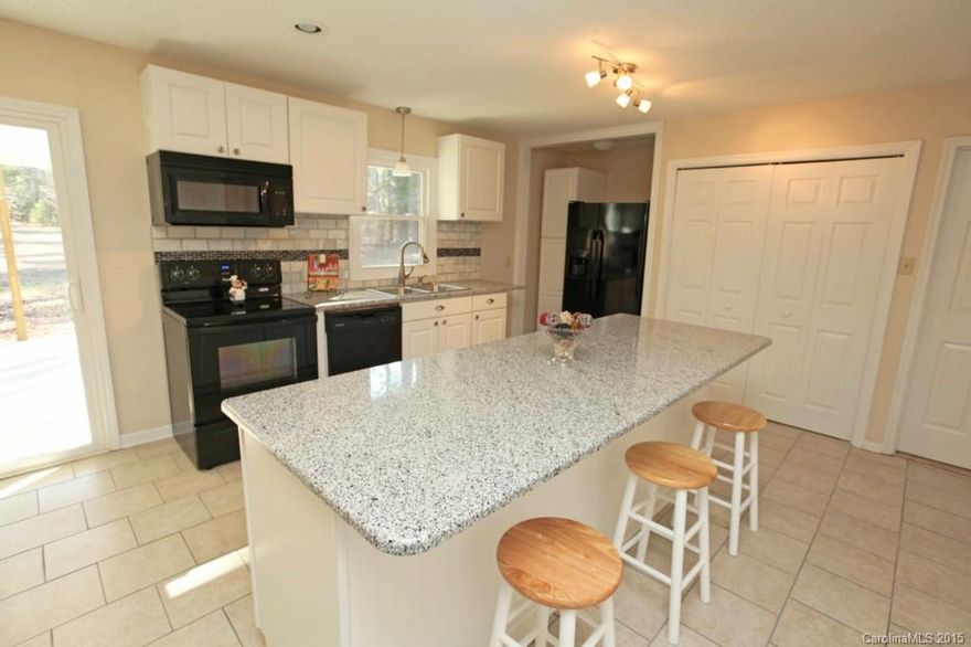 Better then new! Over 1 acre! Completely renovated! All you have to do is move in... Granite counter, Tile back splash, brand new appliance. Open floor plan, huge master with a fantastic master bathroom! Want a nice flat, giant backyard that backs to trees? This is the one! Currently set as a 4 bedroom but if you want a 3 bedroom with a formal dinning room, the builder would consider remodeling to allow it. Sit on the back covered porch and enjoy life!