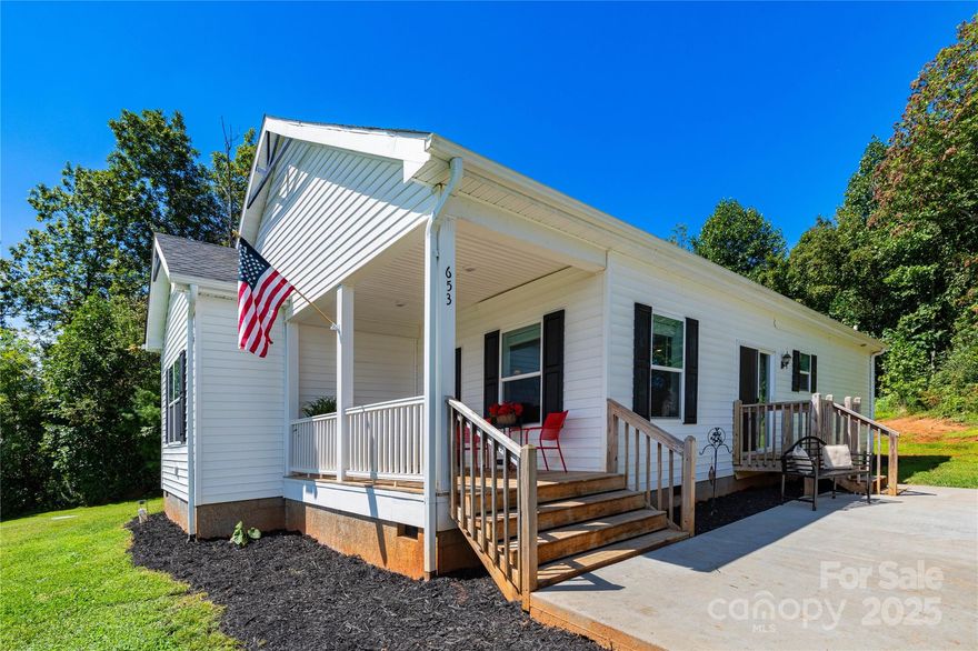 Exciting news , this perfectly balanced mountain retreat in Alexander is back on the market, due to Buyers financing failing through and now is your chance to own it . This charming 1500+ square foot home combines comfort, views and land in one amazing homestead. Nestled on 3.85 usable acres, the property offers sweeping long range mountain vistas you will want to soak up daily. Great features included a large detached garage ideal for a workshop or parking a camper, a boat, or both. Spacious interior layout with split bedroom floor plan and 9 foot ceilings. The exterior offers a concrete patio for outdoor dining and entertaining along with a fire pit area for relaxing evenings. Ample land offers privacy, garden areas, with a small shed and a fenced pasture area already in place for a mini farm or space for additional building sites. Conveniently located less than 10 miles to Weaverville and 11 miles to Downtown Asheville with both offering many great amenities of restaurants, shopping, health care facilities and county parks and recreation for enjoyment.