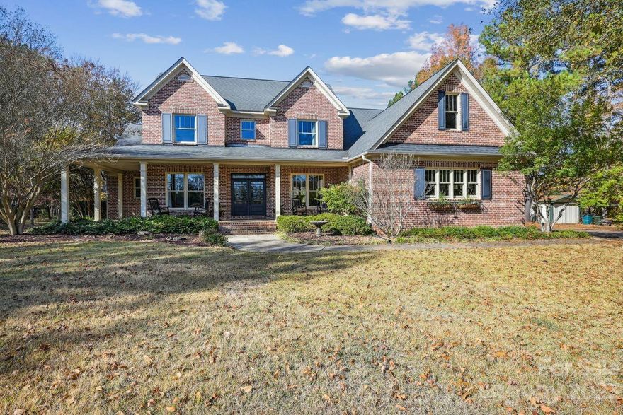 Stunning custom home with barn and riding ring on 6.44 acres! Beautiful large kitchen with stainless appliances, gorgeous cabinetry and two amazing granite islands making entertaining a breeze. Formal dining room and large great room.   Two incredible wood burning fireplaces-the first is located in the cozy keeping room, adjacent to the kitchen and breakfast room and the second in the great room living room. Spacious primary bedroom on main level. Primary bath features a luxurious clawfoot tub, frameless shower and granite vanity. Additional secondary bedroom and full bath, office/craft room,  and large laundry room with drop zone and utility sink complete the main level. Upstairs you'll find two additional bedrooms, each with private bathroom, an enormous bonus room and media room.Outside, a lovely in ground swimming pool, fire pit, barn with office, horse arena, tractor shed, and fenced pasture. HVAC units new in 2020. Perfectly located close to I-77, shopping and downtown Rock Hill.