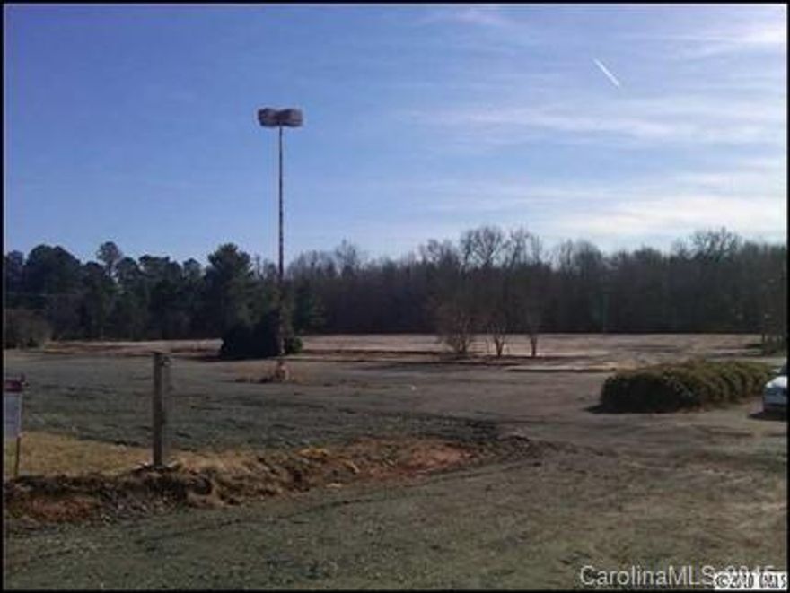 GREAT OPPORTUNITY  AT $5.96/SF
Car Count Albemarle Rd 60,000+/day
Car Count Central Ave 45,000+/day     
Located on the "home stretch" from Upton to East side of town, I-484, etc   
Approx. 60.000 SF Concrete Slab (5” thick) 
Remainder of Lot: Lot SF: 233,594 Black Top    
Approx. 60,000 SF Concrete Slab (5" thick) 
Rest of lot has ASPHALT w/ approx. 400-450 Parking Spaces  
Asphalt lot 2-3" thick w/ fill material consisting of sandy clayey silts w/ gravel or alluvial soils below