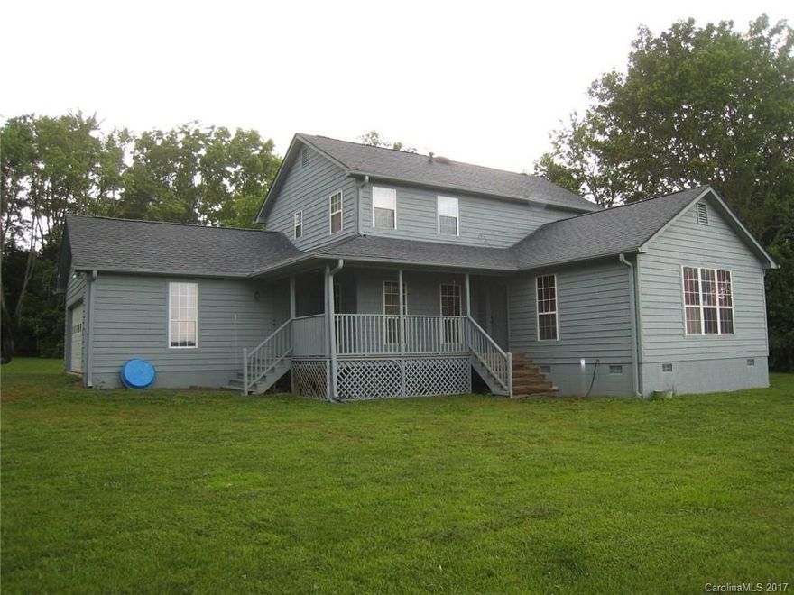 Beautiful horse farm with 177' of frontage on the French Broad River, a 96' x 66' indoor riding arena and a stable.  Pasture is fenced and level, with great views of the mountains. House has a large master bedroom on the main level, as well as a large family room with a view of the horses in the pasture.  Easy access only minutes from downtown Brevard, 10 minutes to Dupont with miles of riding trails.  Exterior of home has just been repainted!