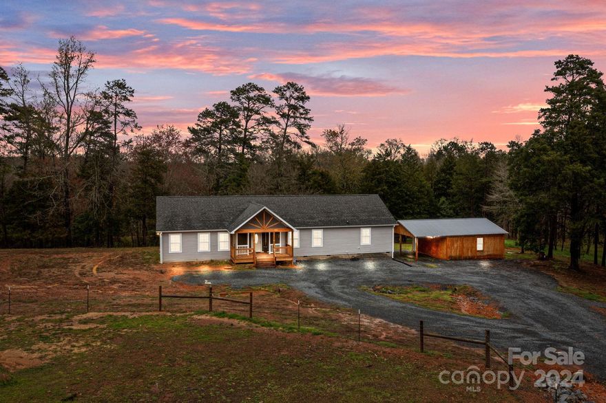 Discover serenity on this 10-acre property with a Beautiful Off-frame Modular home built in 2021. Tucked away for ultimate privacy, the property features a picturesque pond and fenced pasture, perfect for quiet reflection or outdoor activities. Enjoy modern comforts like an on-demand gas water heater and included appliances in the freshly painted interior. Entertain or unwind on the screened back porch, overlooking the tranquil surroundings. Work from home in the dedicated office space, then retire to the expansive primary suite boasting a luxurious walk-in shower and generous walk-in closet. Adjoining 10 acres also available (MLS #4129960).