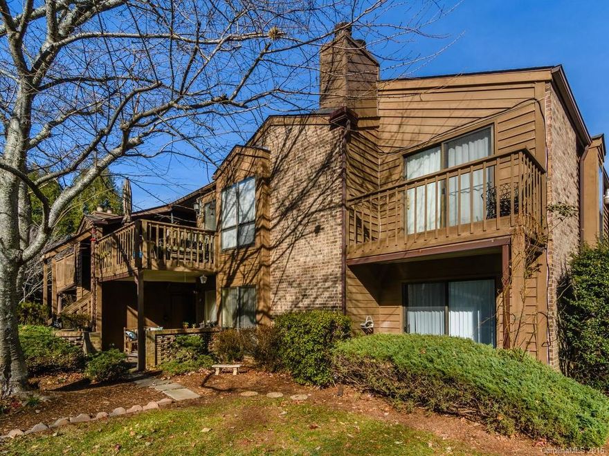 Enjoy everything that south Asheville/ Arden has to offer in this fantastic street level condo in Ravencroft. Large front patio area overlooks courtyard with trees and green space. New floors in kitchen and bathrooms,, two large bedrooms with en suite bathrooms, spacious living and dining rooms, wood-burning fireplace - this condo has it all!
