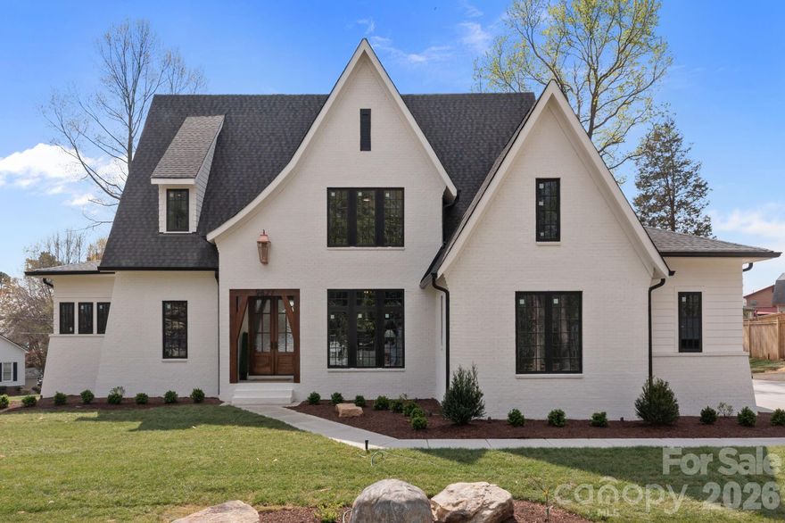 Welcome to 9627 Rivera Drive—where timeless design meets tranquil lake living, complete with lake access to Lake Norman.

This custom, one-of-a-kind home was thoughtfully crafted with a focus on timeless architecture and refined elegance. From the moment you arrive, the architectural presence stands apart—defined by steep, sloped rooflines, refined proportions, and a dramatic copper gas lantern framing the entry. A 9-foot front door welcomes you into expansive interior spaces with soaring ceilings and clean, intentional lines that reflect a level of design rarely found in today’s market. As evening falls, the home transforms with professional uplighting that highlights its architectural features—creating a truly striking presence that is truly unforgettable after sunset.

This 4-bedroom, 3.5-bath residence features high-end finishes throughout, including matte Taj Mahal quartzite countertops, custom white oak cabinetry, full spray foam insulation, and a handcrafted custom railing that adds a distinctive architectural element. The open-concept living spaces are filled with natural light, highlighted by expansive windows that frame peaceful views of Lake Norman from nearly three-quarters of the lot. The living room’s statement fireplace and wood beam accents create a space that feels both elevated and inviting, while the kitchen is a true centerpiece—designed for both everyday living and effortless entertaining.

The primary suite is a retreat of its own, offering beautiful lake views, a spa-like bath with a full soaking tub, walk-in shower, and a seamless connection to the custom walk-in closet. Upstairs, thoughtfully designed spaces include a Jack-and-Jill bathroom layout along with a versatile bonus room—perfect for a media room, playroom, home gym, or additional office space. Additional features such as a dedicated library with custom white oak built-ins and a functional mudroom add both character and practicality.

Outdoor living is equally intentional with a screened-in back porch complete with propane lines run for heaters to keep you cozy, perfect for year-round enjoyment. Car enthusiasts will appreciate the nearly 12-foot garage ceilings designed to accommodate a lift, along with a 60amp EV charger plug.

Tucked on a quiet, low-traffic road, this home offers a rare sense of privacy and calm. Enjoy the benefits of lake life without the constraints—this neighborhood provides lake access, allowing you to keep your boat at home and easily launch just minutes away.

No detail was overlooked in the design and execution of this home—creating a space that feels as special as it is functional. If you’ve been searching for a home that stands apart from the rest—this is it.