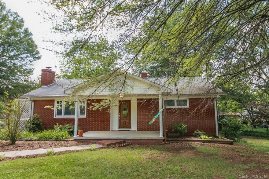 Nicely maintained ranch home in the heart of Mooresville. Situated on half an acre fenced property with apple and pecan trees. Backs up to Edgmore Park. Detached garage and barn wired for electricity. Covered front porch and side deck. Large great room w/wood burning fireplace. Kitchen with lots of countertops and a nice dining/breakfast area. Great Room, master bedroom, guest bedroom and 3rd bedroom/den all have original hardwood floors. Next to South Elementary School and Mooresville High.