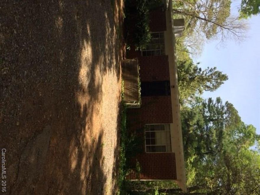 Great investment! Location a plus in Fewell Estates. Two 1 bedroom units. Larger unit has fireplace. Will not last al this price. Oversized lot. Priced under tax value.