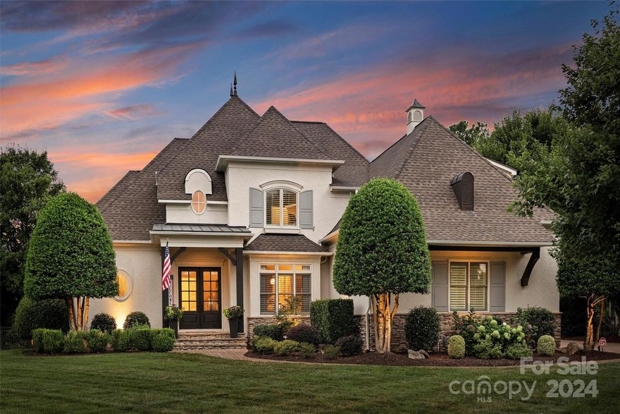 Welcome to 137 Cape Cod Way in The Point! Resting on a premier lot directly across from Lake Norman, this home underwent an extensive renovation with the utmost attention to quality and detail! Upon entry you'll be impressed by the impeccably designed interior and inviting open floor plan. The main living room opens to a covered terrace and a private outdoor oasis awaits with heated pool/spa. A new state-of-the-art commercial grade kitchen, private office with designer finishes, dining room & a stunning new primary suite add to the comfort and exclusivity of this home. Upstairs you'll find 3 add'l bedrooms plus a bonus room all with designer finishes. More upgrades include: New tankless water heater, theatre system/surround sound, custom cabinets/built-ins, custom closets, window treatment, designer lighting, encapsulated crawlspace, pool/spa/fire pit, extended driveway,  HVAC units (2022). Don't miss this incredible opportunity to tour this impressive residence in The Point!