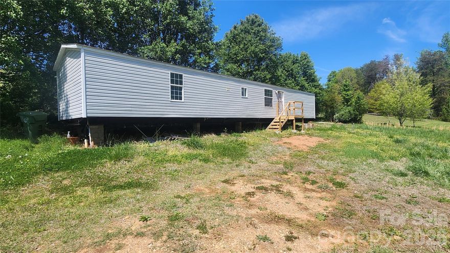 Cash-only investment opportunity in a convenient Newton location. Situated on approximately 0.6 acres, this 2-bedroom, 2-bath single wide offers plenty of potential for investors, flippers, or buyers looking for their next renovation project. Conveniently located near downtown Newton, local shopping, restaurants, schools, and everyday conveniences, with easy access to main roads for commuting. With a spacious lot and value-add potential, this property is a great opportunity to transform and maximize.