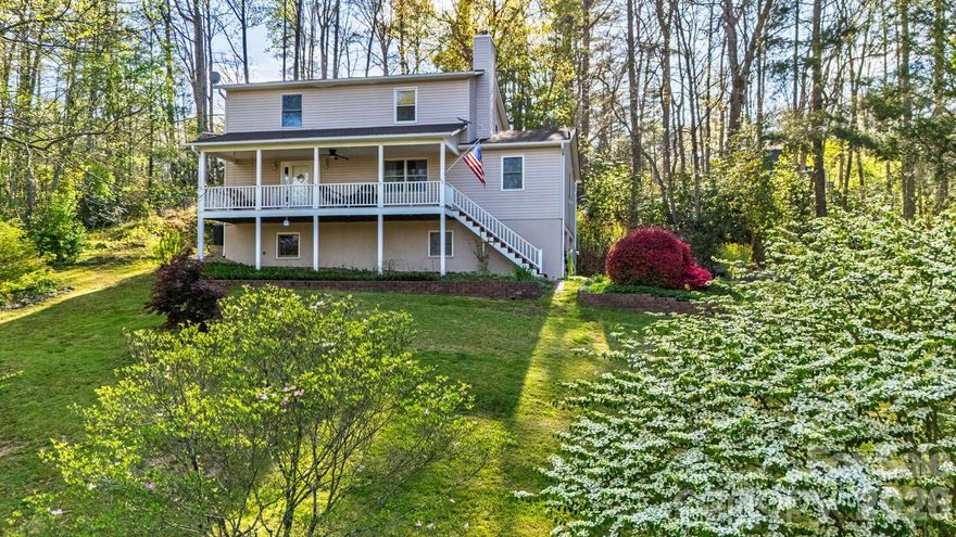 Tucked away in a private and quiet area as the only home in the cul-de-sac of Byers Park, this beautiful Fairview home is ready for its next chapter! Whether you’re envisioning a full-time residence, short-term rental potential, or the perfect mountain getaway, this home delivers the kind of versatility you’ve been waiting for. Imagine morning coffee on the covered front porch appreciating the year-round mountain sunrise views, gardening in the sunny yard, or relaxing on the private back deck. Step inside to discover a generous, free-flowing floor plan that moves effortlessly from the living room to the kitchen and dining area, providing a welcoming environment for both quiet mornings and hosting guests.
With a main-level primary suite and a second primary suite upstairs plus two additional bedrooms, there is ample space for everybody. The upstairs primary bedroom also features a unique private balcony, perfect for al fresco dining. Downstairs, a den and bonus room allow for a variety of uses including a home office, media room, playroom, or art studio. 
Practical features such as a laundry room and half bath on the main floor and extensive storage throughout the home help ensure a seamless daily routine. 
A spacious two-car garage adds extra storage for outdoor hobbies and decorations. Outside, the fenced backyard provides a blank canvas for gardening, outdoor recreation, or evening gatherings. A separate storage shed adds more utility for outdoor hobbies. 
This home is perfectly positioned just minutes from popular destinations like Whistle Hop Brewing, Turgua Brewing, and Daymoon Coffee. Easy access to the Blue Ridge Parkway puts world-class scenic drives, hiking, and outdoor adventure within minutes for the true nature enthusiast. A short drive connects you to the electric energy of Asheville or the charming small-town feeling of Hendersonville. Schedule your visit to this versatile mountain home today!