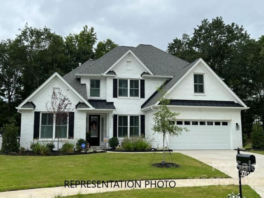 NEW CONSTRUCTION!!! Primary Bedroom Down!!! You will love all the custom features in this well appointed NEW CONSTRUCTION!!  Stunning White Painted Brick elevation .  All the most sought after features like gourmet kitchen with large island, built in ss appliances.  Quartz countertops in kitchen and all baths.  Wide plank laminate hardwoods and 8' doors throughout the main level and Primary Bedroom. Downstairs Primary Bedroom boasts large bath with tub and tile built shower with seamless glass enclosure and a huge walk-in closet.  Upstairs 3 Bedroom, 2 full Baths, Loft and a Bonus Room w/closet!!  Great entertaining on your 12x20 covered stamped/stained concrete porch that includes a stone fireplace!!  Large backyard...with trees!!Convenient to shopping and recreation on Lake Wylie.