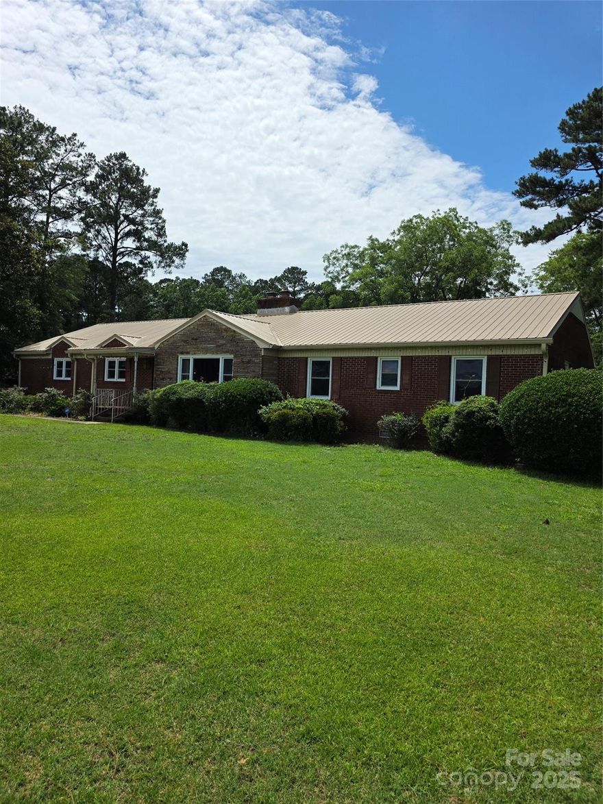 The epitome of country living! This 3 bedroom, 2 full bathroom, 1 half bathroom home sits on 1.45 acres of land. It includes an attached 2 car garage and ample driveway space for visiting friends and family. Out back there is a 2nd half bathroom. And for an added bonus this home is 45 minutes from the beach. This is a great primary residence or a second home when you just want to get away. It just needs a little TLC....Home will be sold 'As Is".