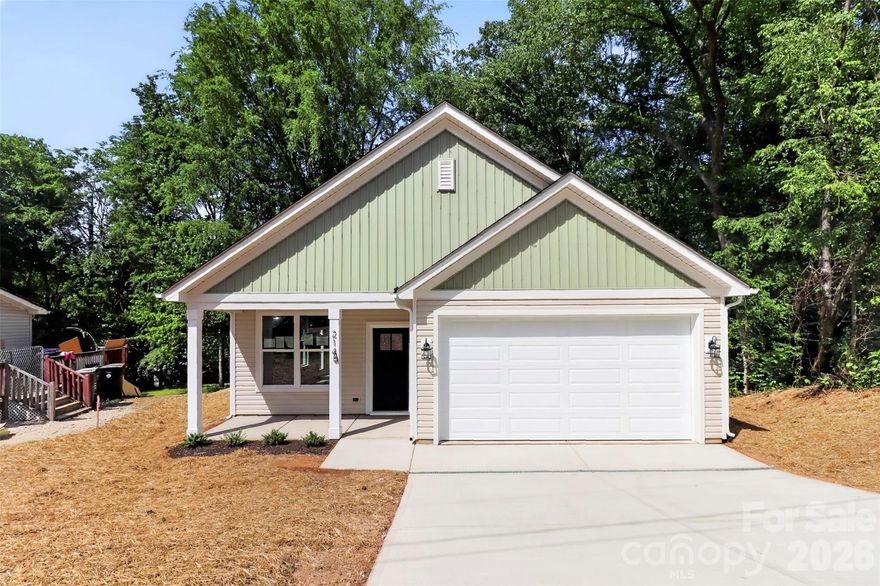 Brand new construction in a prime Concord location! Welcome home to 214 Arizona Place NW in Concord, NC – a stunning newly built 3-bedroom, 2-bathroom residence offering approximately 1,485 square feet of bright, efficient living space. Thoughtfully designed with today’s lifestyle in mind, this home delivers the perfect blend of style, functionality, and low-maintenance living. Step inside to discover an open-concept layout bathed in natural light, where the spacious living area flows seamlessly into a modern kitchen. Enjoy crisp new finishes throughout, including sleek Quartz countertops, contemporary cabinetry, and energy-efficient appliances. The primary suite offers a peaceful retreat with a generous bathroom and ample closet space, while the two additional bedrooms provide flexibility for family, guests, or a home office. This efficient floor plan maximizes every square foot, creating a comfortable, inviting atmosphere ideal for first-time buyers or investors seeking homeownership in a growing community. Located in a convenient northwest Concord neighborhood just minutes from everyday essentials: shopping, dining, parks, and major highways for an easy commute to Charlotte. Enjoy the best of small-town charm with quick access to Concord’s vibrant amenities, excellent schools, and recreational opportunities. Schedule your showing today and experience the excitement of new construction living!
