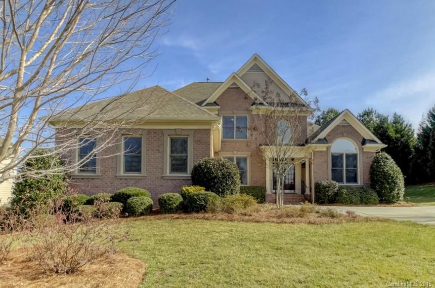Prepare to be wowed! Master bdrm on main, h/w floors, fresh paint, custom closets, big open storage areas, 1st floor office w/built-ins, formal D/R, open kitchen w/bar and brkfst area, crown molding, new roof, plantation shutters, laundry rm w/chute & fabulous storage, family room overlooking exquisite backyard w/landscaping, pergola, saltwater pool, multi-tiered patios, lighting, Jacuzzi & fire pit for chilly nights. Fully equipped home theater/bonus w/7.1 Surround sound system. Low SC taxes!