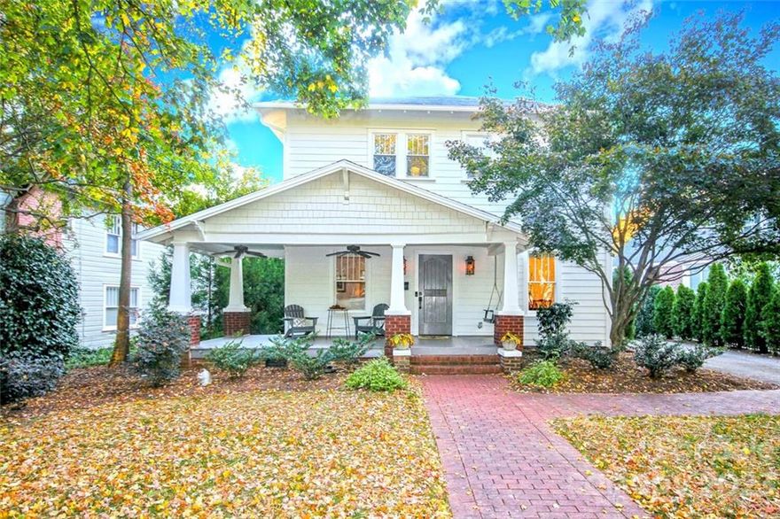 Historic charm meets modern updates! This inviting Eastover home, built in 1919, has been carefully maintained and renovated and features plenty of living space, hardwood floors, high ceilings, and natural light. Main floor includes a living room, dining room, kitchen, breakfast room, family room, powder room and a guest room with en suite bath. The kitchen features white cabinetry, quartz counters and Wolf appliances, opening to the breakfast area and family room. Upstairs features a sitting area (could be play room or office) with three bedrooms, including a spacious primary suite featuring walk in closet, large bath, sitting area and private covered porch.  A partially covered rear deck overlooks a freshly landscaped and hardscaped backyard. Walkable to neighborhood park with tennis, bball and playground, restaurants and more! Commute to Uptown and the major hospitals is app. 5 minutes. All new exterior paint, slate patio and mudroom with drop zone (Summer 2022).