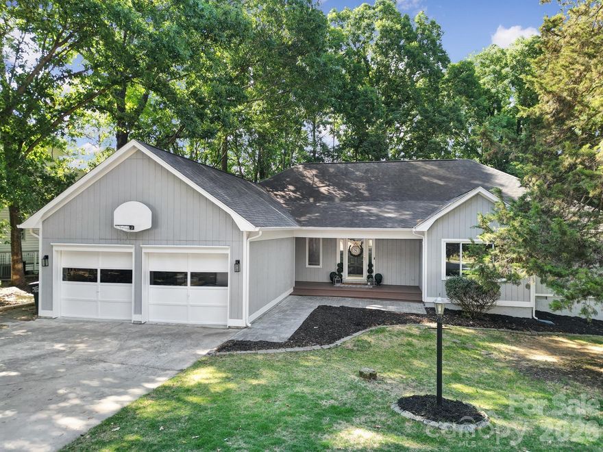 Welcome to this Tega Cay charming 3-bedroom ranch offering comfort, privacy, and access to an incredible lifestyle with a DEEDED BOAT SLIP right in the neighborhood. Freshly painted exterior with a functional floorplan features a spacious living room with fireplace, dedicated office, formal dining area, and breakfast space off the kitchen. Enjoy year-round relaxation in the bright 4-season room overlooking the flat, private backyard. The primary suite offers direct access to a large deck extending across the back of the home — the perfect place to enjoy morning coffee or entertain guests outdoors. Additional features include a 2-car garage. Ideally located near Tega Cay amenities including Windjammer Park, walking trails, golf, tennis, pickleball, waterfront recreation, and more. A rare opportunity to enjoy lake living with convenience and privacy all in one!