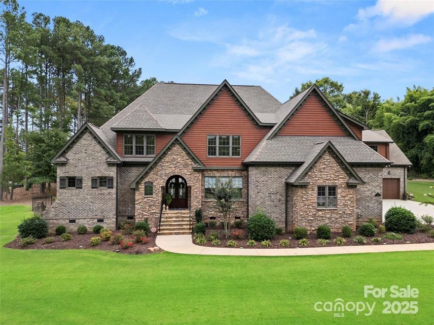 Gorgeous Tudor Estate with exceptional features in Irongate! Open floor plan with rich hardwood floors throughout the main living areas. Great room features a beautiful, coffered ceiling, stone fireplace, and custom built-ins. The kitchen includes a center island, granite countertops, gas cooktop, and tile backsplash. Luxurious primary suite on main. Primary bath has jetted tub, double vanities, and huge walk-in tiled shower. Tons of space on the second level! Bonus room plus a fully equipped media room with fireplace, wet bar and wood floors. 3 car attached garage, and 2 car detached garage with EV charger. 2nd living/guest space over the detached garage is complete with a full bathroom and large bonus room. Step out back to your private oasis with luxury pool, lush landscaping and covered patio w/ built-in firepit. This stunning home sits on a private 1.7 acres. Gated community with equestrian facilities, walking trails, and a pond. Don't miss your chance to own this one!