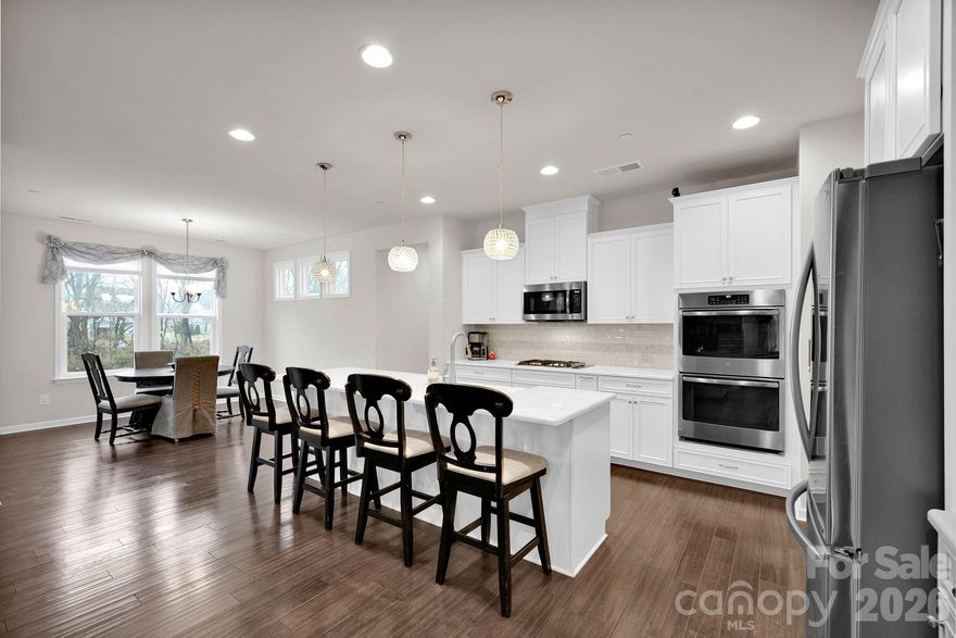 Not every home marks a new chapter — but this one was designed to.

Because this is what moving forward actually looks like.

Welcome to the next chapter in the highly sought-after Allen Mills community in Concord — where space, style, and lifestyle finally align with where you are in life.

If your current home feels tight, outdated, or like you’ve simply outgrown it, this 4-bedroom, 3.5-bath home is the upgrade you didn’t know you were waiting for. Freshly painted walls, open-concept living, and a striking stone gas fireplace instantly create a feeling of warmth and possibility the moment you walk in. This isn’t just square footage — it’s breathing room.

The kitchen isn’t tucked away — it’s the centerpiece. With stunning quartz countertops, a large island built for gathering, and a seamless view into the great room, you’re never disconnected from the action. Holidays feel bigger here. Game days feel louder. Conversations last longer. This is the kind of layout that brings people together instead of separating them.

And then there’s the flexibility your current home probably doesn’t have.

Two bonus spaces give you options — home office, gym, playroom, media room — without sacrificing bedrooms. The additional loft adds even more versatility. Life changes. This home adapts with you.

Love the idea of slowing down? Start your mornings on the inviting front porch with coffee in hand. As the day winds down, move to the screened-in back porch for relaxed evenings without bugs or distractions. The fenced backyard offers privacy, room for pets, space for kids, or even that outdoor oasis you’ve been talking about creating.

This isn’t just a house with rooms. It’s a home designed for real life — for growing families, for hosting friends, for working remotely, for building memories instead of just maintaining a mortgage.

If you’ve been feeling like it might be time for “more” — more space, more comfort, more lifestyle — this is your sign.

Don’t stay stuck in a home that no longer fits your future.

Come see what’s waiting for you.