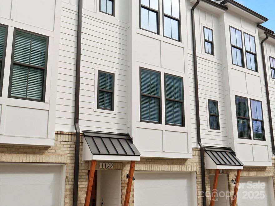 Stunning like new 4 story townhome complete with rooftop terrace and bonus/bedroom on 4th floor. Ask about seller paid Closing Costs or to lower Your Interest Rate. Located in the highly desirable Belmont Neighborhood, this craftsman style architecture on the Outside and Upgraded Premium Features on the Inside complete this stunning home.  You'll Love Coming Home and Parking in Your Own 2 Car Attached Garage w/ Garage Door Opener. Walk Upstairs and Enter the Open Concept Living w/ Dining Area, Kitchen and Great Room. Delight in the Upgraded Features such as: 6" engineered light oak engineered Hardwood Floors Throughout, Oak Tread Staircases, White Craftsman Style Cabinets, Quartz Countertops, Stainless Steel Appliances include Range, Dishwasher, Microwave, Touchless Kitchen Faucet, Refrigerator, Designer Lighting, Black Door Hardware, and more! This unit separates itself from the others because of the fantastic private view you have from your private rooftop terrace. Seller is offering $10,000 in seller paid closing cost with an acceptable offer. Home qualifies for a 0% down payment mortgage with First National Bank  Please see attachments for details.