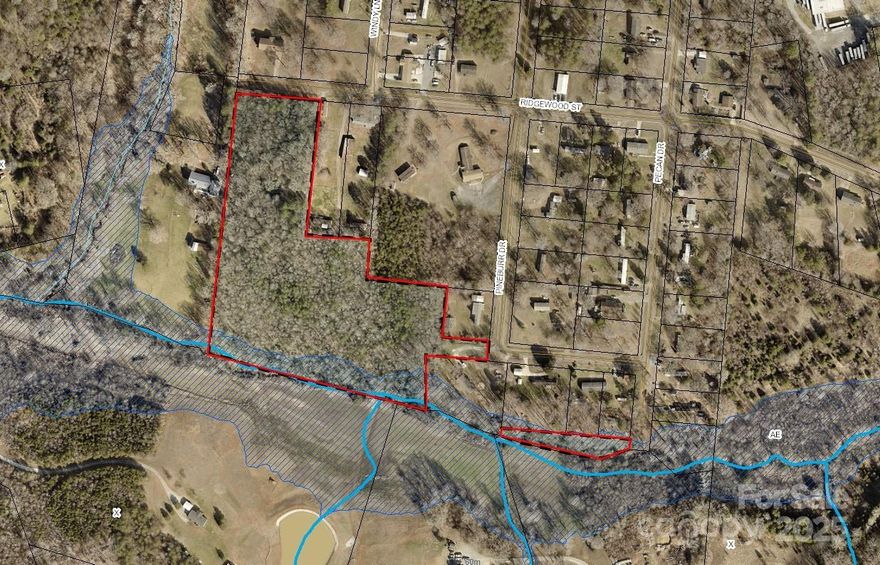 Approximately 9.25 acre wooded building parcel in Whispering Pines subdivision. Approx 268 ft of road frontage on Ridgewood Street, approx 61 ft on Pineburr Drive & approx 31 ft on Pecan Drive. County water is available, but not connected. A septic tank would need to be installed. Parcel is large enough to build your new dream home and have seclusion and privacy.