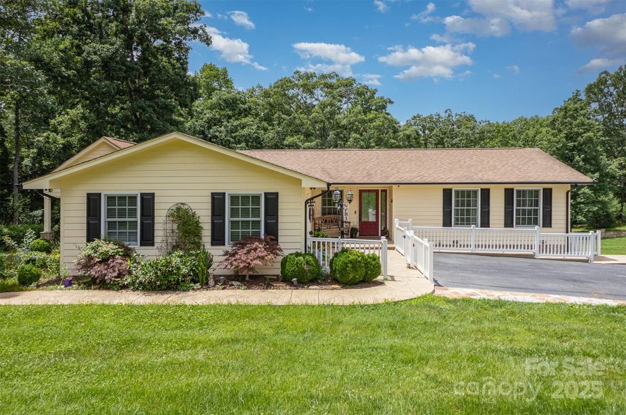 This serene 5.88 acre retreat offers peace and tranquility just minutes from I-40.  Enjoy outdoor living at its finest on the spacious stone patio, complete with a pinewood ceiling, ceiling fans, wood burning fireplace, and a mounted tv - perfect for entertaining or relaxing with a view of the pond which features a fountain, small deck, and walking trail.  On the left side of the property, you will note the custom built playhouse (wired for electricity and cable) and the above ground pool.  Inside the home offers an ideal layout for both everyday living and entertaining.  The cozy dining room and breakfast nook include a charming wood-burning fireplace and a large bay window overlooking the pond.  The primary suite features a sitting/study area,  closet with built in shelving in addition to a walk-in closet, and a spacious ensuite bath with garden tub, dual sinks and vanity, as well as a separate shower.  Highest and best offers must be submitted by 6pm on 6/25/25.