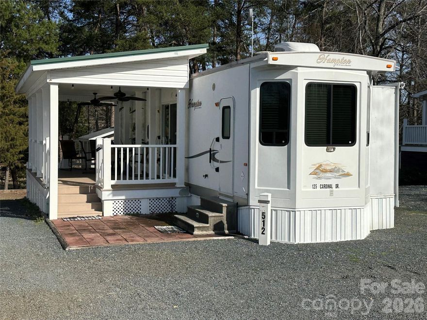 Welcome to lake life at its best in Badin Shores Resort! This 2-bedroom destination trailer with a covered porch is centrally located within the resort, offering easy access to all the fun and amenities while providing the perfect spot to relax and unwind. Enjoy your morning coffee or evening gatherings on the spacious covered porch. The property features abundant parking—perfect for both your vehicle and boat. A storage building provides great space for stowing all your lake gear, fishing equipment, and outdoor essentials. Badin Shores Resort is known for its vibrant community and year-round events and activities. Amenities include a swimming pool, fishing pier, boat ramp, basketball and pickleball courts, horseshoe pits, putt-putt golf, playgrounds, picnic pavilions, and so much more. Whether you're looking for a weekend retreat or a low-maintenance lake escape, this property offers the ideal blend of comfort, convenience, and resort-style living.
